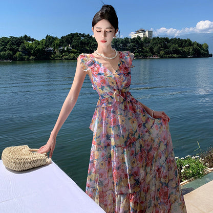 2025 Beach dress long dress elegant floral V-neck dress women's summer seaside vacation long skirt backless lace-up skirt