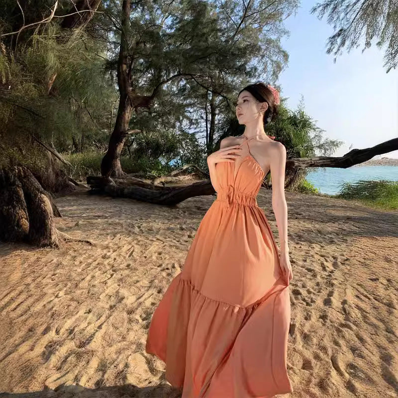 2025 Seaside vacation beach dress suspender dress women's summer gentle wind high sense temperament loose pendulum long skirt