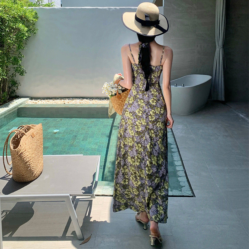 2025 retro floral suspender dress women's summer Korean version waist thin medium and long dress seaside vacation long skirt