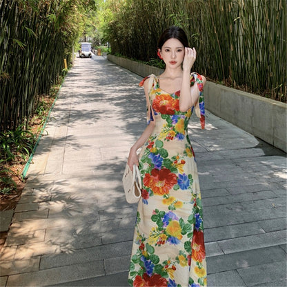 2025 vacation style retro printing suspender dress women's summer artistic sense big flower backless seaside photo dress